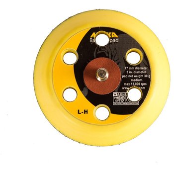Plateau de densité intermédiaire pour disque autoagrippant, fourni avec un protecteur de plateau et des instructions d'utilisation.